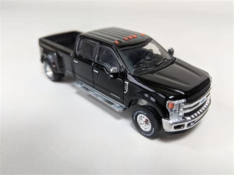 toy truck with trailer and skid steer|toy ford f350 dually truck.